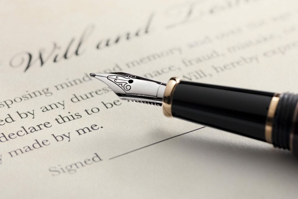 pen writing a will and trust
