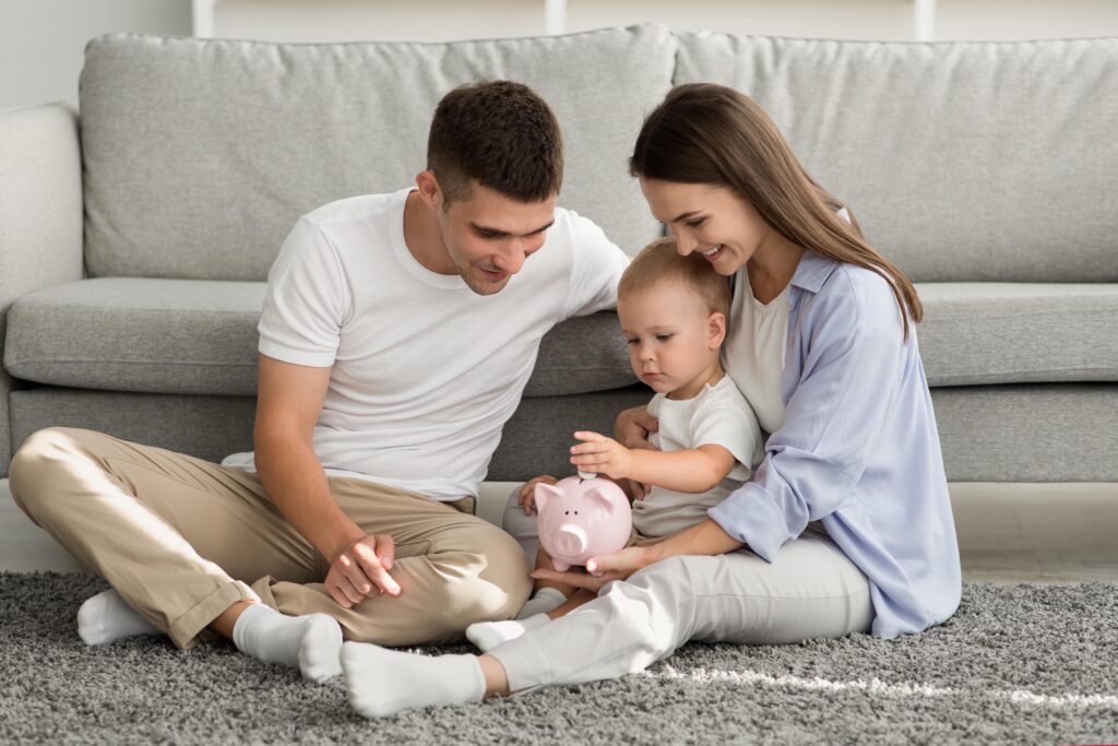 family-budget-happy-parents-looking-at-infant-son